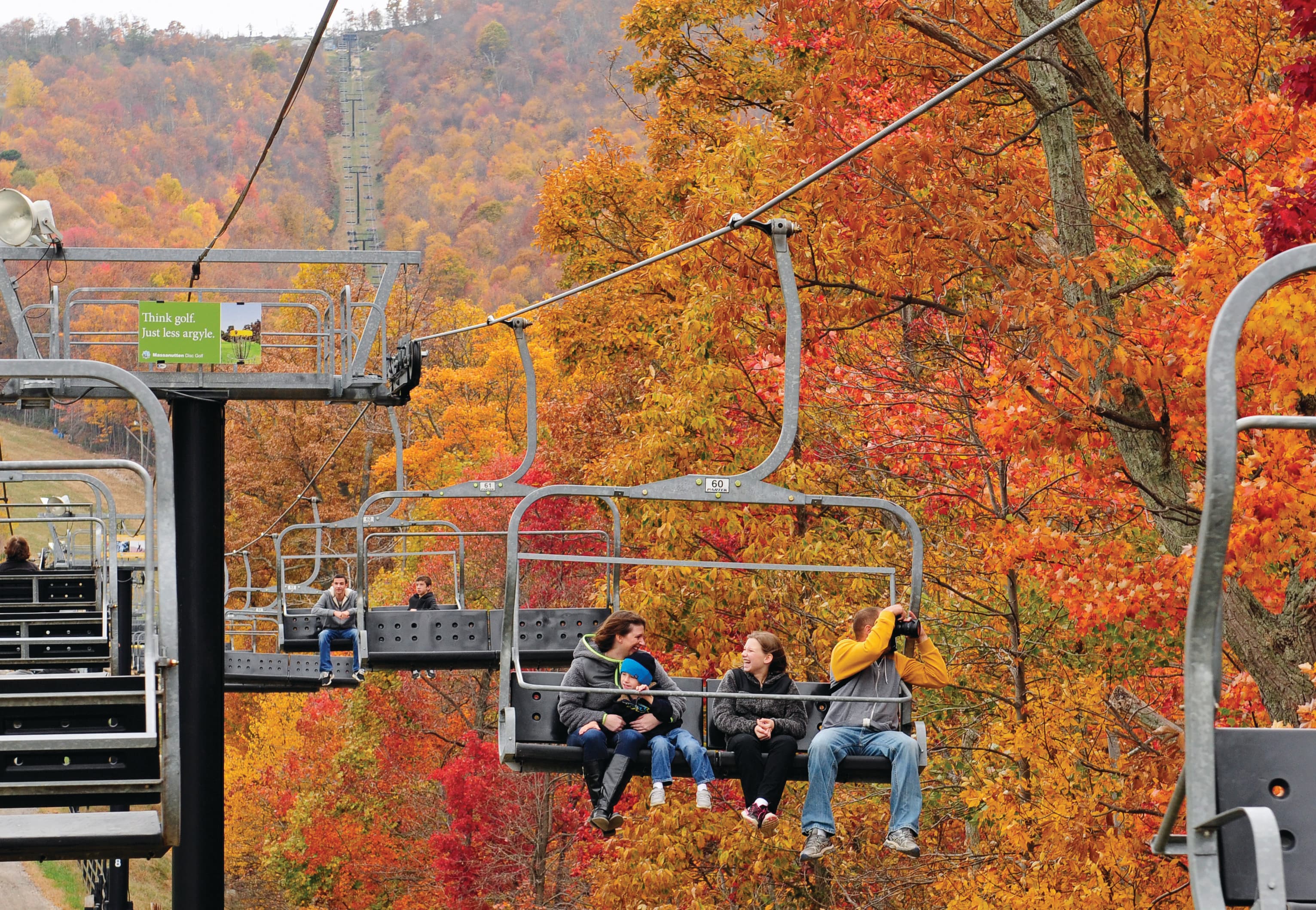 Chairlift over fall foliage at Massanutten