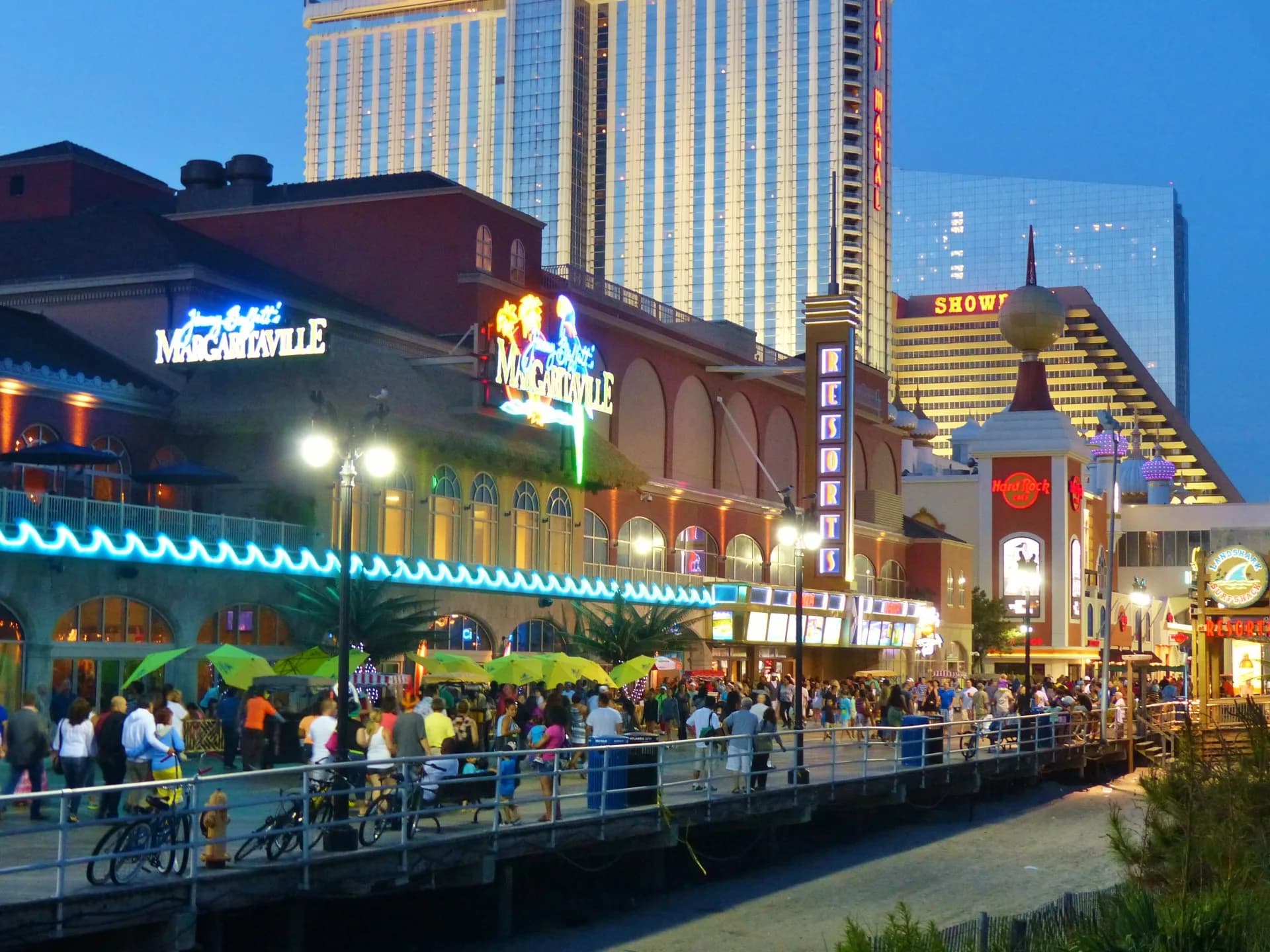 The Atlantic City Boardwalk lit up at dusk