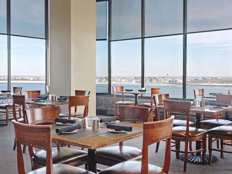 Dining room with floor-to-ceiling ocean views
