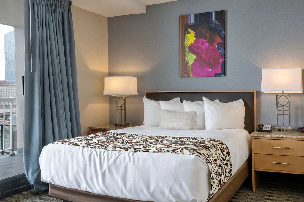 Suite bedroom with balcony access at the Flagship Resort